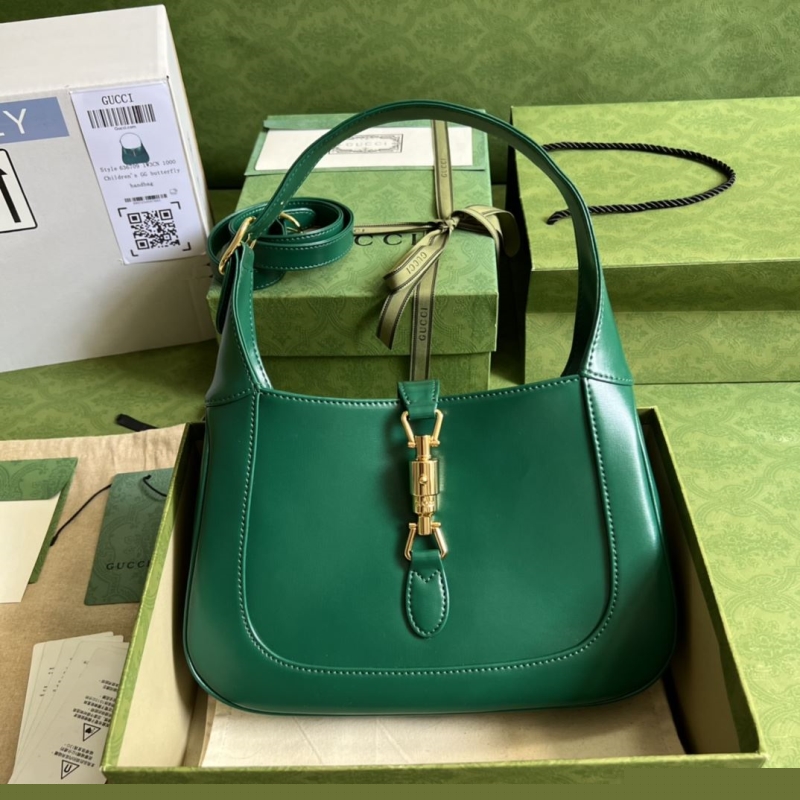 G*u*i top handle bags